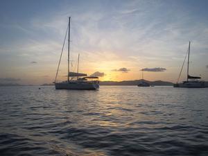 Returning to the boat at sunset after an afternoon swim photo copyright Karen E. Lile taken at  and featuring the  class