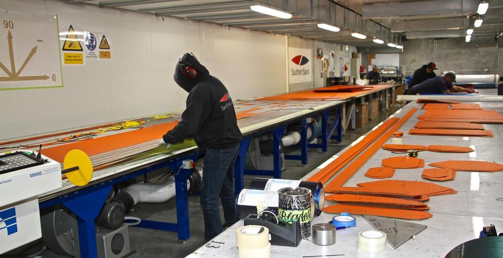 Cutting pre-preg boom patches in a cold, temperature controlled room with a robotic cutter - Southern Spars, Avondale facility, Auckland NZ April 18, 2016 photo copyright Richard Gladwell www.photosport.co.nz taken at  and featuring the  class