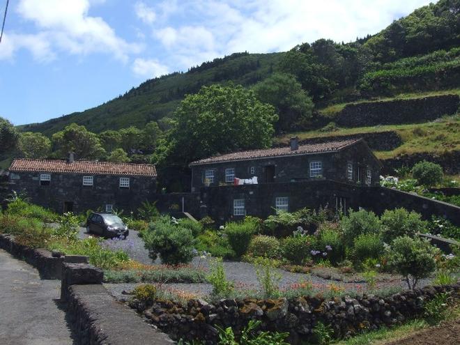 Homes constructed with volcanic rock. It is cut for tiles, bench tops and numerous other things © SV Taipan