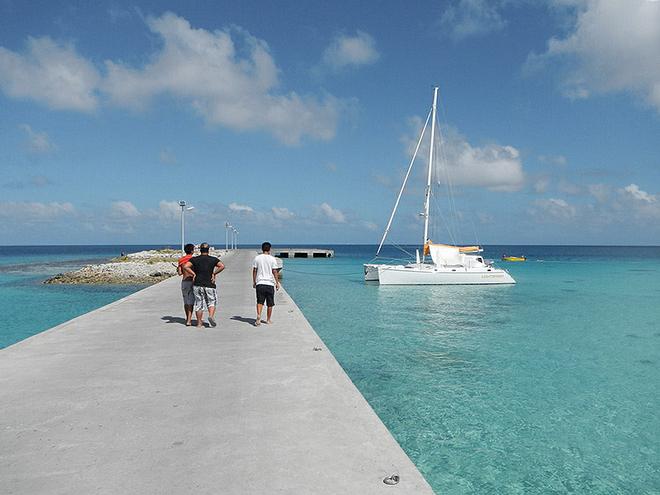 SV LightSpeed moored to the quay at Makemo - pic courtesy www.ecosailingcharters.com © Event Media