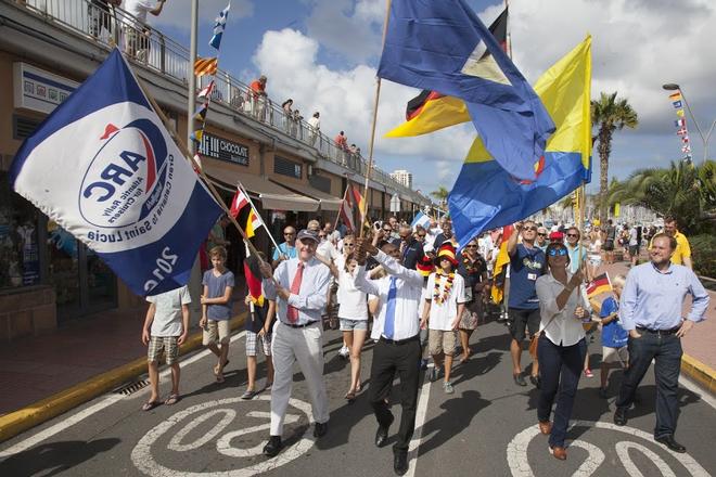 ARC 2016 Opening Ceremony with the flags of the 31 nations of ARC participants lead by World Cruising Club Managing Director Andrew Bishop; Saint Lucia Minister of Tourism, Dominic Fedee; Consejera de Turismo del Cabildo de Gran Canaria, Señorita Inés Jiménez and Concejal de Ciudad de Mar, Senor Jose Eduardo Ramirez. © WCC / Clare Pengelly