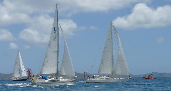 Frannie B chased across the start line by Anakin © World Cruising Club http://www.worldcruising.com