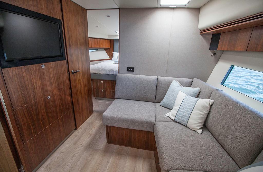 Lower TV lounge looking through to the Owner’s Stateroom. - Riviera 4800 Sport Yacht ©  John Curnow