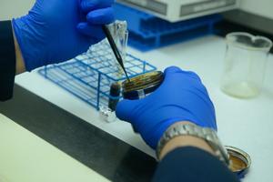 An oil sample is tested at the Coast Guard Marine Safety Lab in New London, Connecticut, Friday, May 19, 2017. Any oil sheens or spills should be reported to the Coast Guard National Response Center at 1-800-424-8802. photo copyright  Nicole J. Groll taken at  and featuring the  class