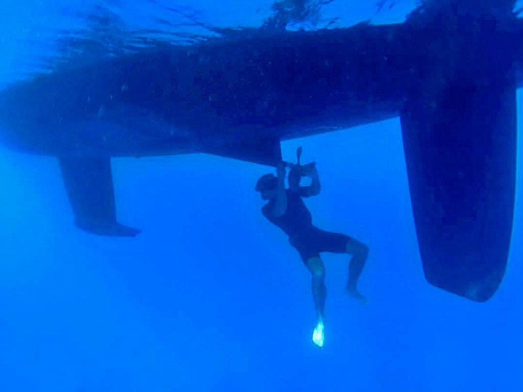 Life is never dull on Te Mana... After fouling our propeller with fishing line debris, we had to replace our cutlass bearing. Always up for a challenge, we chose to do it under water which involved removing the propeller and shaft. photo copyright Te Mana http://http://www.voyageoftemana.com taken at  and featuring the  class