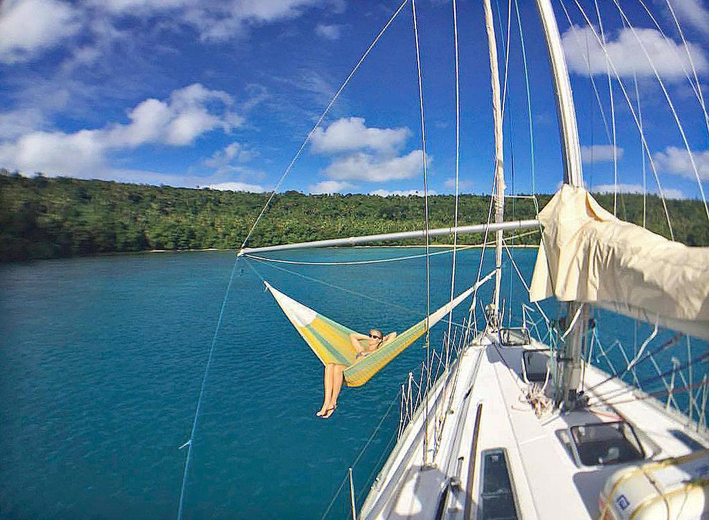 The ultimate setup after a hard day sailing: - Find a beautiful anchorage - Set up a hammock above water - Relax  We've got that one right! photo copyright Te Mana http://http://www.voyageoftemana.com taken at  and featuring the  class