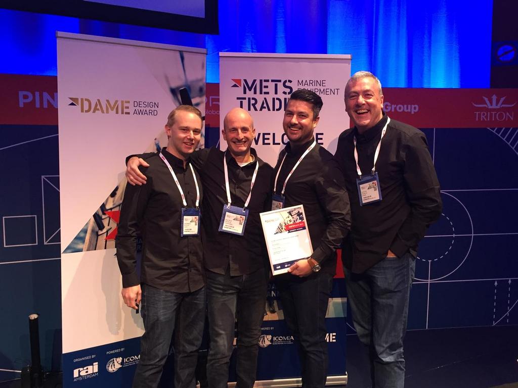 Zhik's design & management team with METS award for Isotak X photo copyright Zhik http://www.zhik.com taken at  and featuring the  class