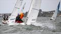 The Dogs 5, sail number 156 (Mark Jewell & Paul Farrall) rounding the windward mark with Sea Pantom, sail number 33 (Peter Thompson & Clara Hunter) in close vicinty in race 6 on Sunday during the Sandhopper Nationals at Thorpe Bay © David Maynard / www.alleycatphotographer.com