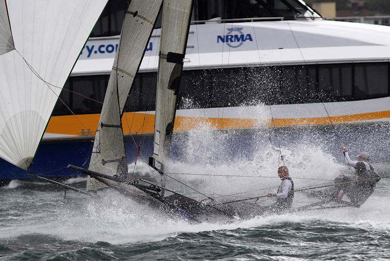 Harbour ferry crosses ahead of race leader Yandoo - 18ft Skiff NSW Championship race 5 - photo © Frank Quealey