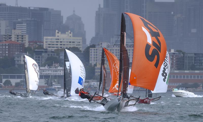 Sixt 18ft skiff racing team racing downwind in a southerly at the Giltinan Championship - photo © SailMedia