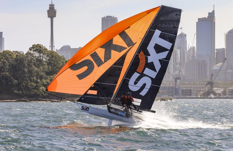 Spinnaker action for the Sixt 18ft skiff racing team in a NE wind on Sydney Harbour - photo © SailMedia