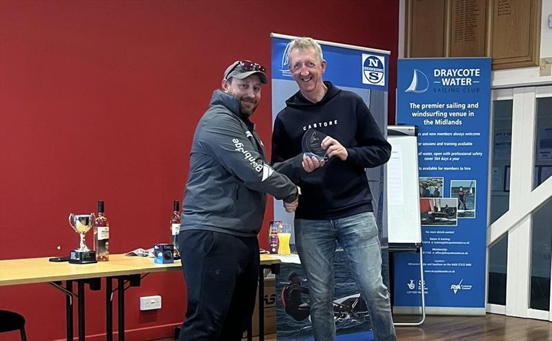 Paul Davis presents Guy Mayger with the Solo Class End of Season Championship 2024 title - photo © Nigel Davies
