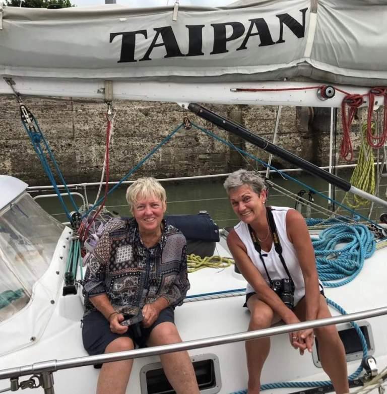 Kris and Corinne taking a break between cooking meals! photo copyright SV Taipan taken at  and featuring the Taipan class