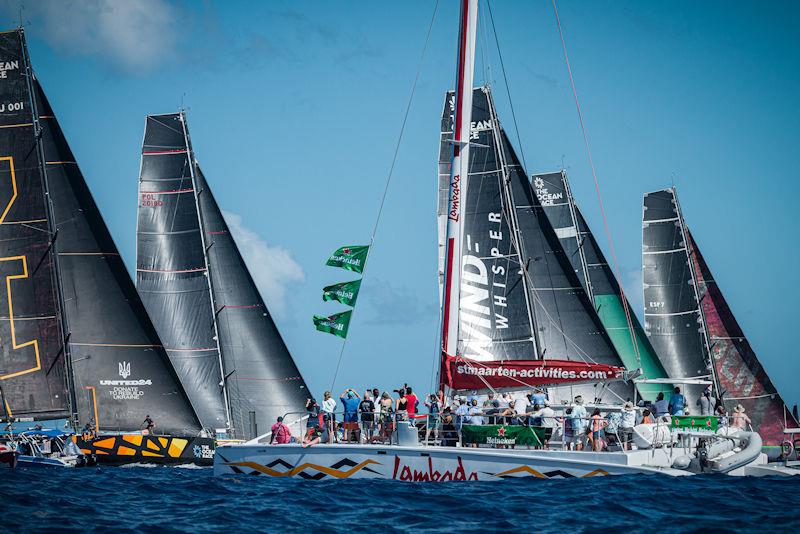 Hundreds of spectators were out on the water this past weekend, enjoying front row seats to the racing excitement at the 43rd St. Maarten Heineken Regatta photo copyright Laurens Morel / www.saltycolours.com taken at Sint Maarten Yacht Club and featuring the Volvo One-Design class