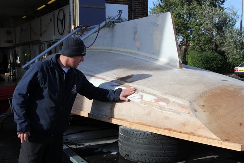 John Gillard with the PBO project boat, an unfinished Secret 20, His students will finish the project with materials and technical advice from West System International - photo © West System International