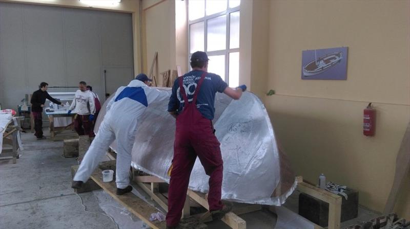 Croatian Gajeta build - third and final layer of biaxial cloth is laid onto the wet second layer photo copyright Wessex Resins & Adhesives taken at  and featuring the  class